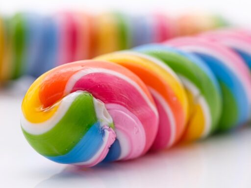Kleurrijke Chupa Chups lollies op een rij, met ronde wikkel